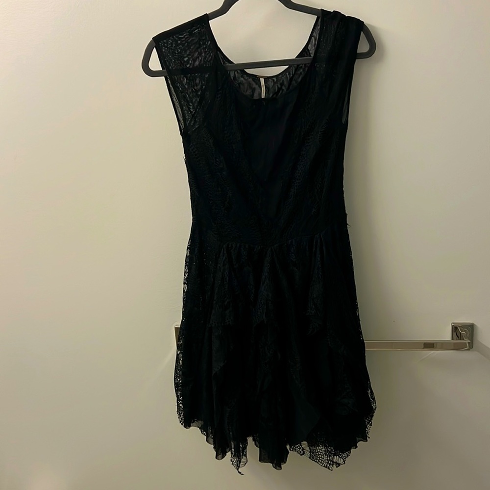 Free people. Small black lace dress. Excellent condition.
